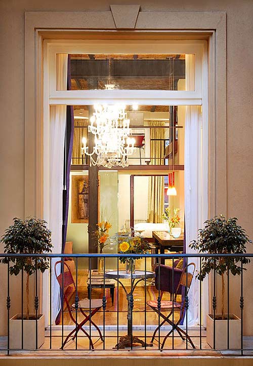 Apart Hotel Buenos Aires Balcony Chair Chandelier Window Plants Table