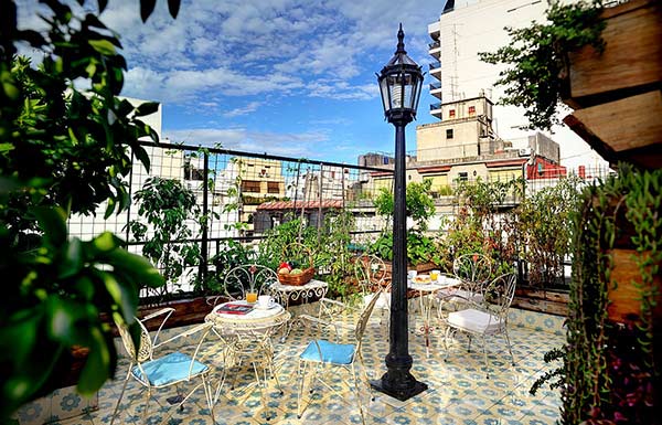 Apart Hotel Buenos Aires Garden Roof Chair Table Lantern Vegetables