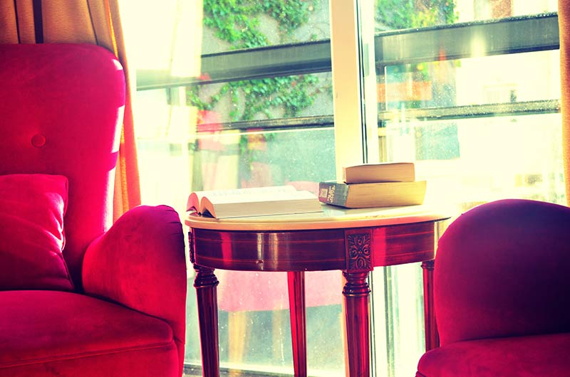Pink Chair Book On Side Table Sunlight